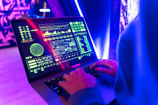 pexels photo 5475750 5475750 Person typing on a laptop with vibrant digital data display, highlighting cyber security.